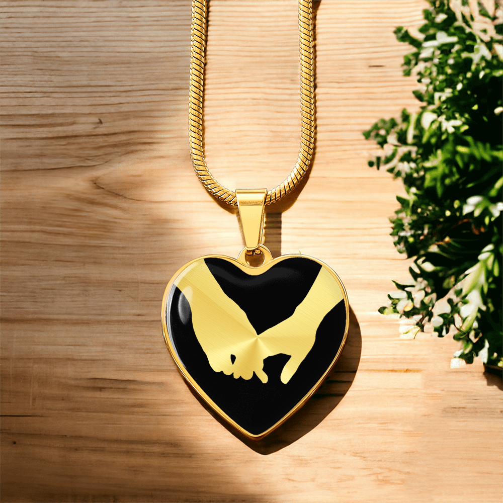 Grasping Hands Heart Necklace